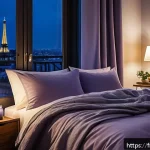 Home 18 불면증 원인과 해결법 - A cozy bedroom scene in a modern Parisian apartment at night, featuring soft lavender and chamomile ...